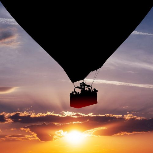 Hot air balloon silhouette in the sunset